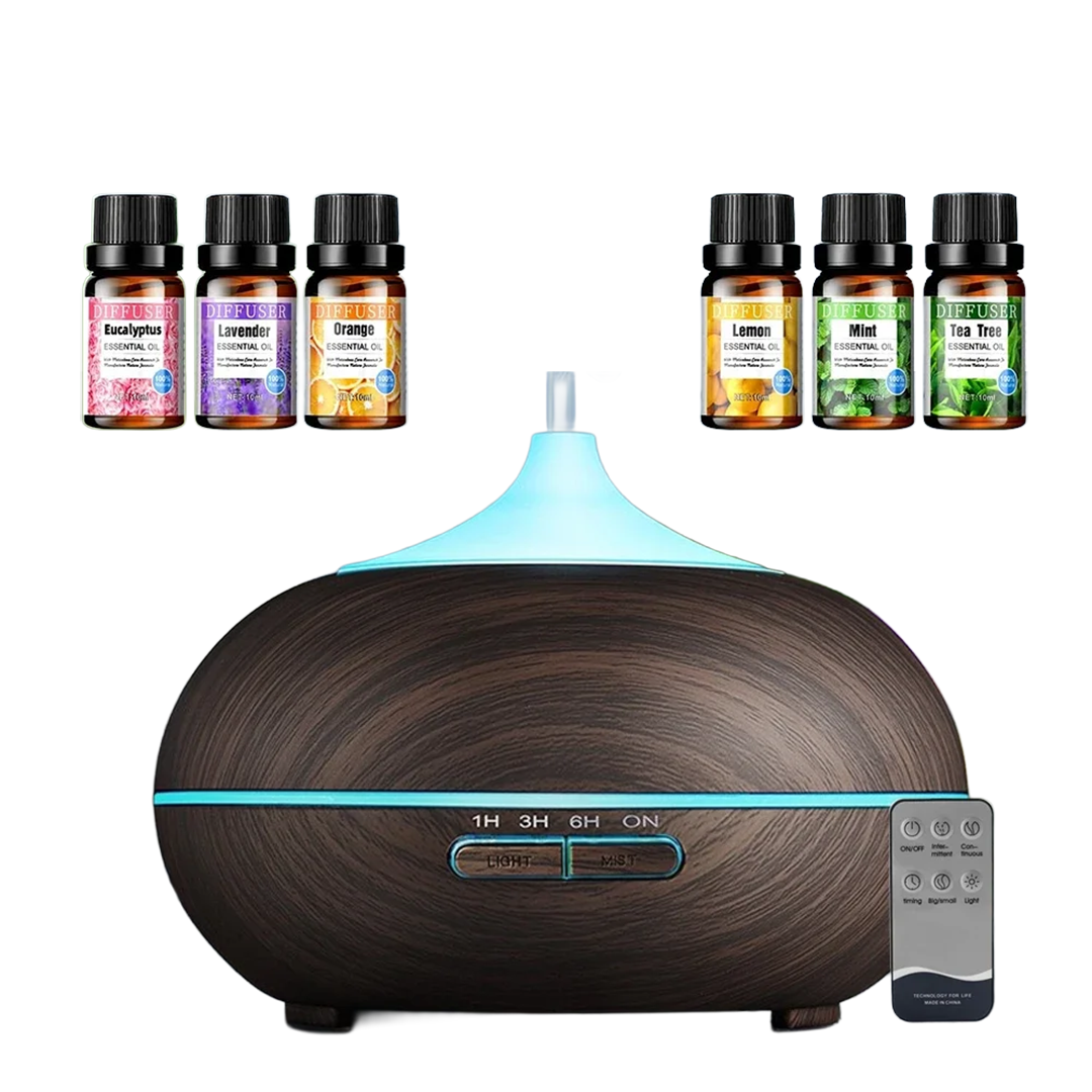 Ultrasonic aromatherapy diffuser with 6 essential oils set on clean white background