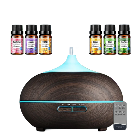 Ultrasonic aromatherapy diffuser with 6 essential oils set on clean white background